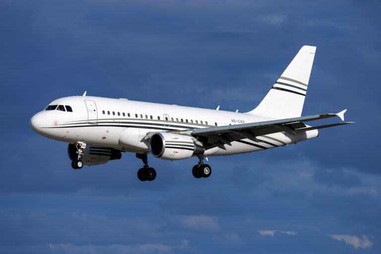 Airbus ACJ318 corporate jet on the ramp, featuring a spacious VIP cabin platform, compact narrow-body design, and long-range private travel capability.