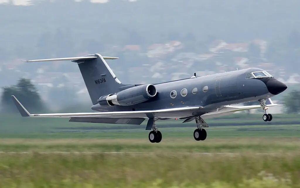 Gulfstream G-III air ambulance aircraft with cargo door open, configured for long-range medical evacuation and patient transport missions.