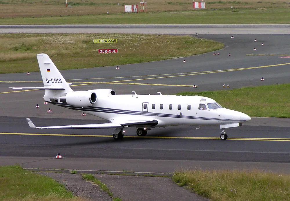 IAI Astra SPX midsize business jet parked on the ramp, featuring swept wings, twin rear-mounted engines, and efficient long-range performance.