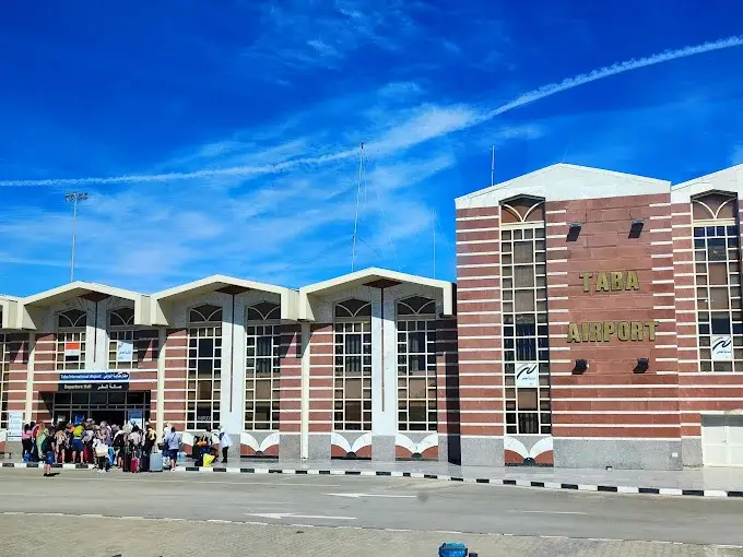 Terminal building of Taba International Airport (TCP / HETB) with passengers outside the entrance in Taba, Egypt. Taba International Airport (TCP / HETB) Private Jet Charter